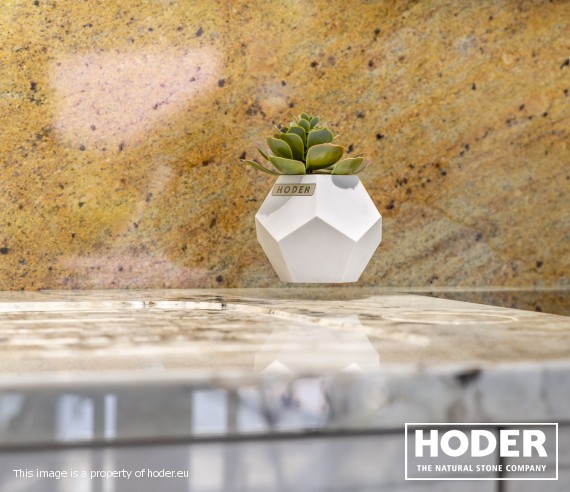 Odkryj prezentownik Hoder, kryjący luksusowe prezenty z kamienia naturalnego. Deski, świeczniki i kostki lodu z możliwością personalizacji i eleganckiego opakowania.